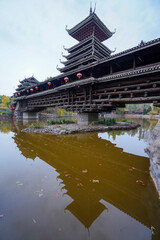 Wall Mural - Wind and Rain Building in Dong Scenic Area of China Ethnic Museum.