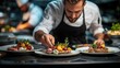 © NAIMAH - Chef plating a delicious dish