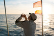 © Ibai Acevedo/Stocksy - Fisherman getting ready for calm fishing day