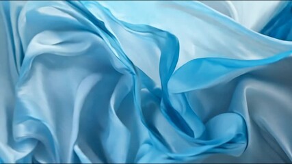 Poster - Flowing fabric in soft blue tones creates an elegant visual experience