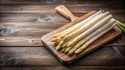 Wall Mural - Fresh white asparagus on a wooden cutting board , vegetables, spring, organic, healthy, cooking, green, farm, food, delicious