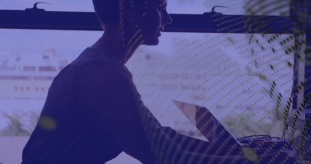 Poster - Image of globe and data processing over caucasian businesswoman using computer in office