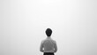 © Steven - Asian male in a white shirt stands alone against a vast, minimalist white background, creating a contemplative and introspective atmosphere.