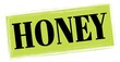 © outchill - HONEY text written on green-black stamp sign.
