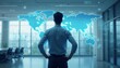 © natakot - A man stands confidently with his hands on his hips, gazing at a holographic world map projected in vibrant blue against a sleek, modern office backdrop. The scene captures a moment of inspiration and