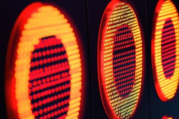 Poster - Close-up shot of a traffic light with red, yellow and green lights