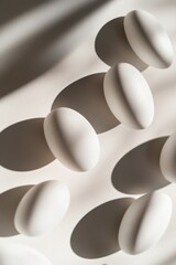 Poster - Collection of white eggs arranged on a table