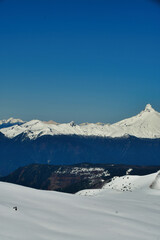 Wall Mural - Puntiagado vulcano chile patagonia Winter snow panorama