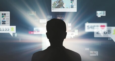 black silhouette of a person is overwhelmed by social media postings, flying content video and image