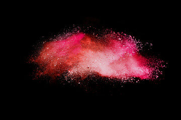 Wall Mural - abstract powder splatted background. red pink powder explosion on black background. colored cloud. c