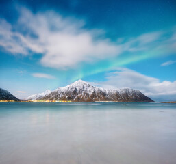 Wall Mural - northern lights in norway, lofoten islands. winter night landscape. starry sky with polar lights. au
