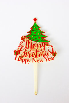 A christmas tree with Merry christmas word isolated on white background, still life.
