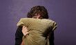 © kues1 - young bearded crazy man hugging a cushion