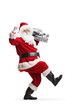 © Ljupco Smokovski - Santa claus dancing and holding a boombox
