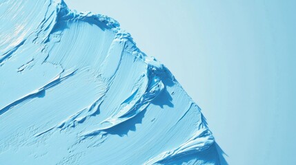 Poster - Thick blue oil paint strokes form smooth, flowing textures that mimic ocean waves, creating a dynamic contrast against a soft, light backdrop. The artwork captures movement and depth