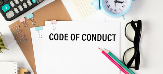 Code of Conduct Text written on notebook page, red pencil on the right. Motivational Concept image