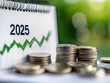© Hellal khan - 2025 desk calendar and stack of coins with arrow rising. The concept of business growth, Financial investment, Market stock, Profit return, Dividend and Business fund in year 2025, JPG, AI GENERATED