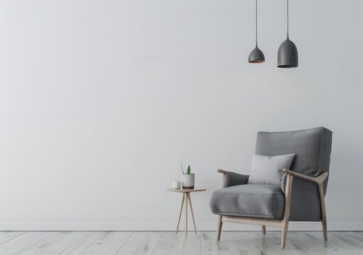 Minimalist living room with a grey armchair. side table. and hanging pendant lights against a white wall
