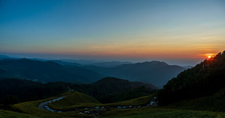 Poster - sunset sky on top of mountain and valleys. Natural landscape