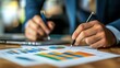 © pongtap - Office workspace financial data trends a professional overview