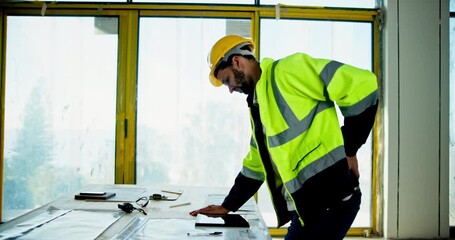 Poster - Architect, construction worker and back pain with drawing, plans and blueprints for maintenance. Architecture, tablet and design professional with sprain, schematics and remodeling for renovation