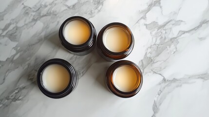 Poster - Various Glass Jars with Cream on Marble Surface Top View