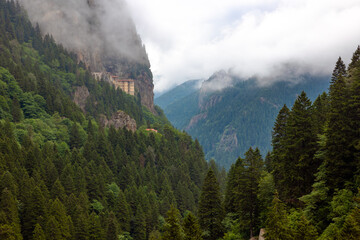 Wall Mural - sumela monastery and misty mountains. visit trabzon background photo