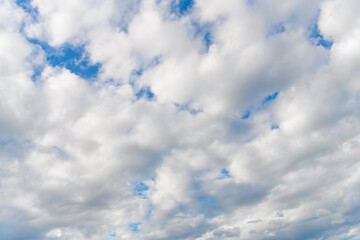 Wall Mural - Beautiful view of blue sky with clouds at sunrise. Sky clouds background. Partly cloudy. Background cloud summer. Sky cloud clear with sunset. Natural sky