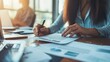 © AlfaSmart - Professional Team Analyzing Business Documents in a Modern Office Setting for Strategic Planning and Efficient Project Management