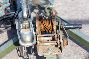 Wall Mural - A rusty chain is attached to a piece of equipment