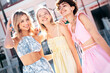 © halayalex - Three young beautiful smiling hipster female in trendy summer stylish clothes. Sexy carefree women posing in the street. Positive models having fun, hugging and going crazy, in sunny day