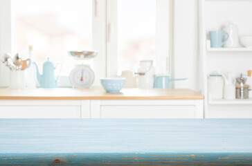 Blue kitchen table background on blur abstract furniture and window sill interior