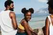 © (JLco) Julia Amaral - Joyful family enjoying a sunny day at the seaside