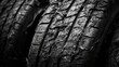 © AIArtistry - Closeup of Weathered and Worn Car Tires Highlighting Textured Rubber and Tread Patterns in Black and White Imagery