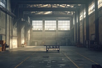 Poster - A spacious, industrial warehouse with natural light streaming through large windows.