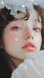 © chic designs - 春のファッションのインスピレーションとなる、星形のアクセントとグリッターをあしらった女の子のクローズアップ