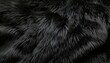 © AlmerGungor - Black fluffy plush shaggy fabric artificial fur background backdrop  close-up