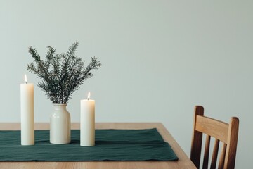 Poster - Minimalist winter table setting with burning candles and foliage