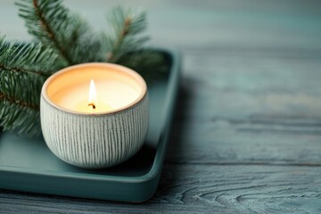 Poster - Burning candle creating cozy atmosphere in winter living room