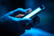 © Marina Demidiuk - Point finger on screen phone closeup, person testing test message, touch blue screen on smartphone. Night Bokeh Light. Close-UP. Person using in hands mobile phone close up in the dark. Online wi-fi
