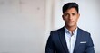 © ado - male indian job candidate in a suit ready for the interview