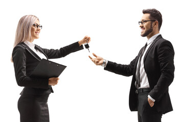 Wall Mural - Businesswoman giving car keys to a businessman