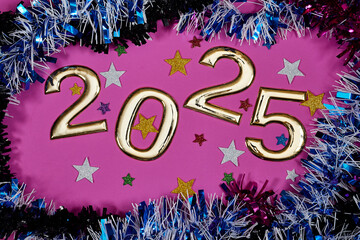 Wall Mural - golden numbers 2025 two thousand twenty five new year with colorful tinsels and stars confetti on pink background