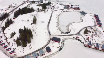 Wall Mural - 4k drone flying over footage (ultra high definition) of frozen kongsjordpollen fjord, vestvagoy, nor
