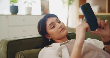 Poster - Bored, browsing and woman with smartphone, home and relax on couch, social media and online in lounge. Rest, sofa and tired of entertainment, website and scrolling of movies, mobile and apartment