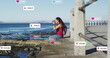 © vectorfusionart - Social media engagement image over woman photographing ocean from pier