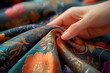 © zhuan - Hand Exploring Colorful Textiles and Fashion Fabrics for Creative Projects