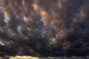 dramatic sky with stormy clouds at sunset. nature background