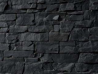 Poster - Textured Black Stone Wall Featuring Various Shapes and Sizes of Natural Elements Suitable for Modern Architectural and Interior Design Projects