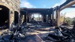 © VirtualVista - Interior of a home devastated by fire showcasing extensive smoke damage and charred remnants of furnishings and structure